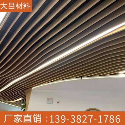铝方通吊顶 铝合金装饰 隔断门头 镂空雕花冲孔 仿木纹造型图3
